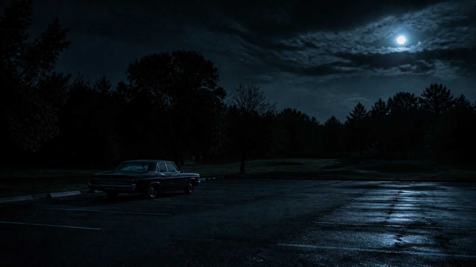Empty parking lot at night with a single car parked under sparse moonlight, trees silhouetted in the distance